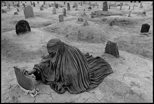  Afghanistan, 1996 - Mourning a brother killed by a Taliban rocket.